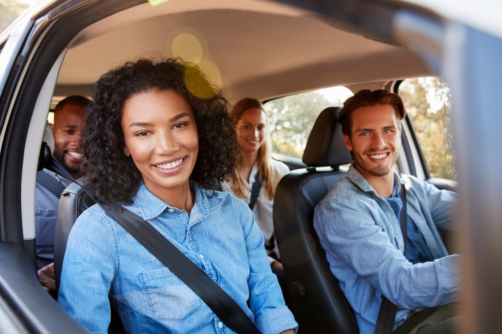Passengers in a professional carpool ride
